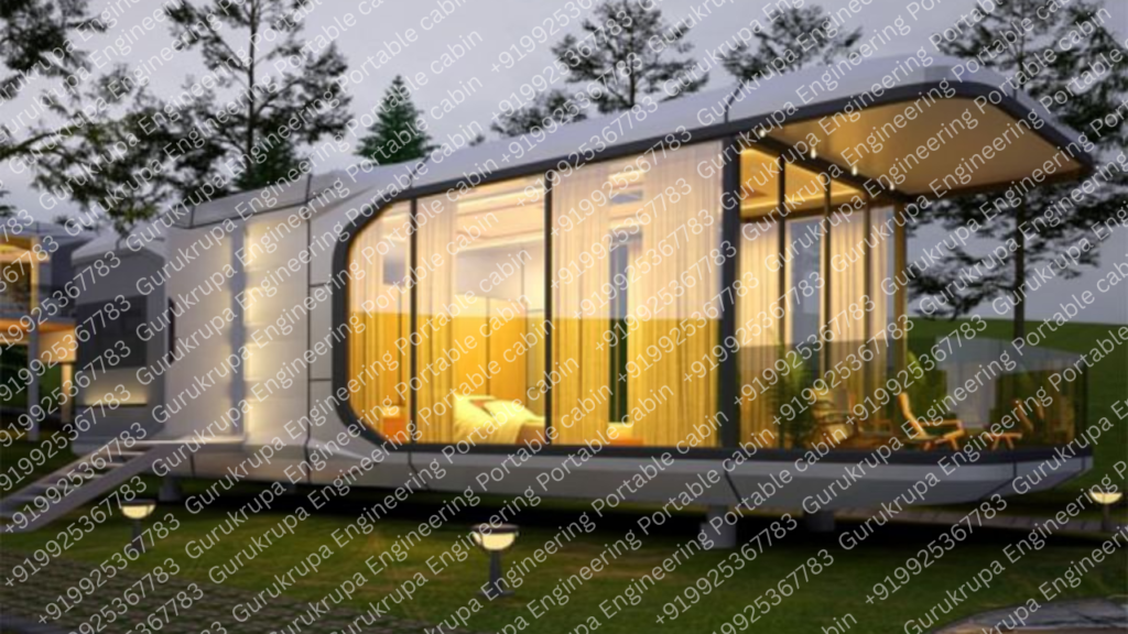Modern black prefabricated luxury capsule cabins and modular glamping pods installed on a snowy pine-covered mountain slope in Manali, Himachal Pradesh.